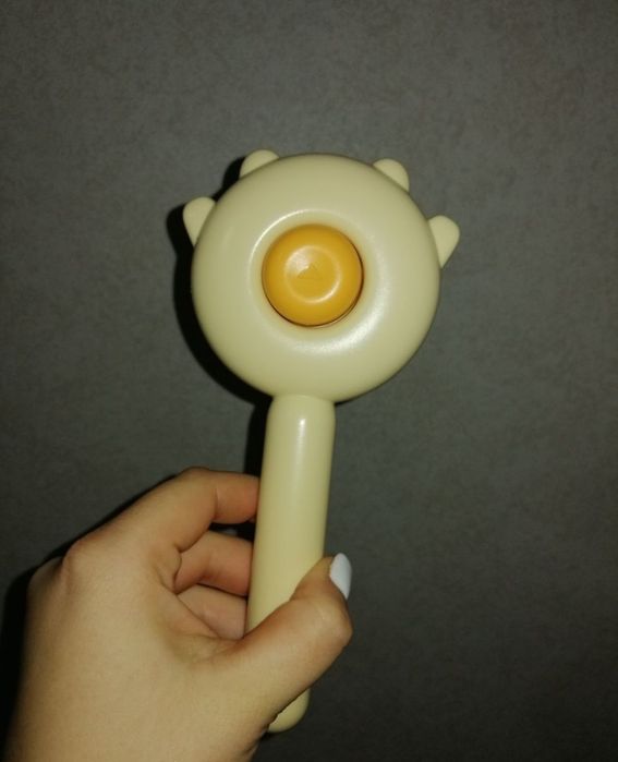 Пуходерка с кнопкой для вычесывания