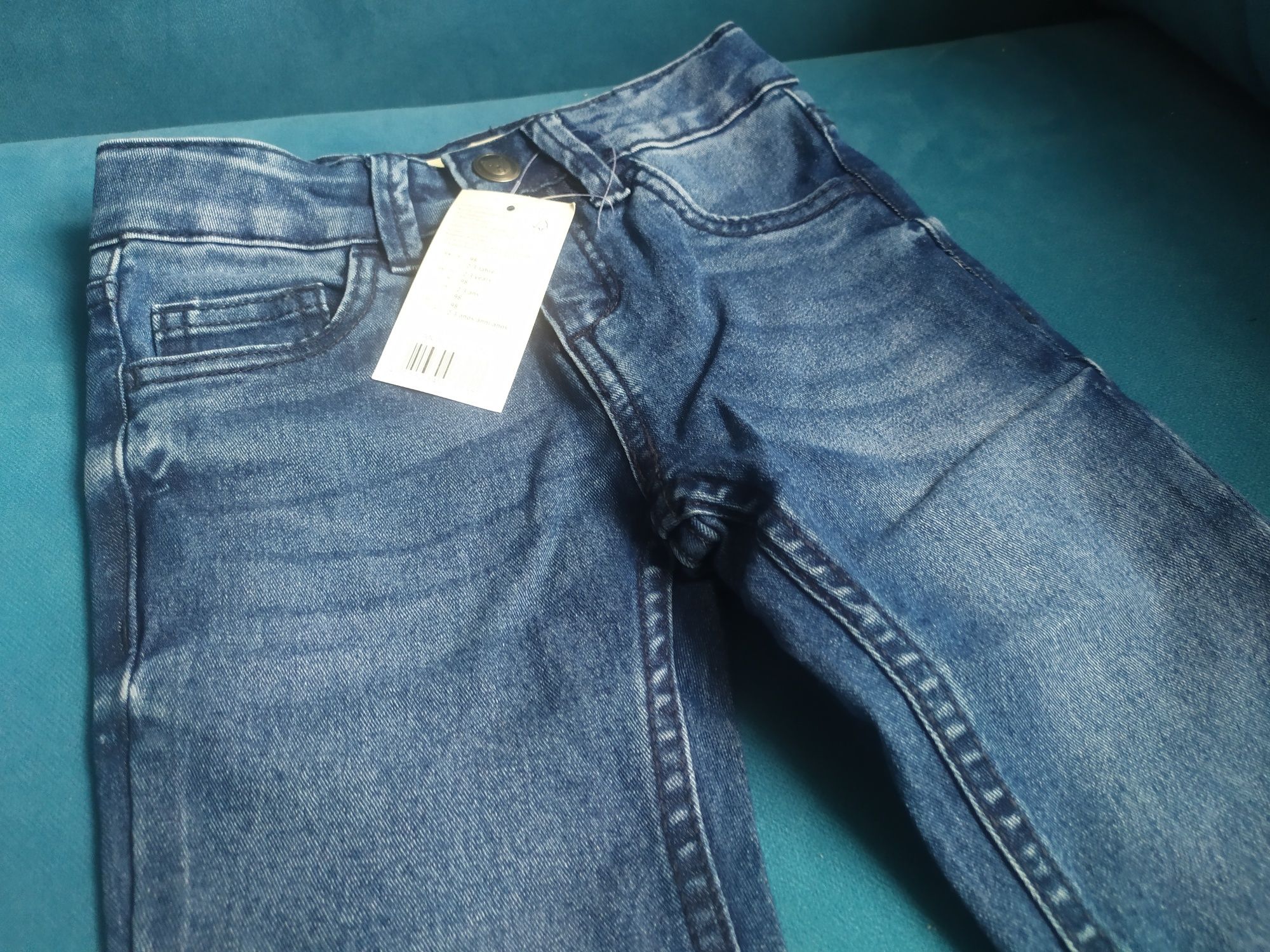 Nowe spodnie jeansowe  slim fit  98/104