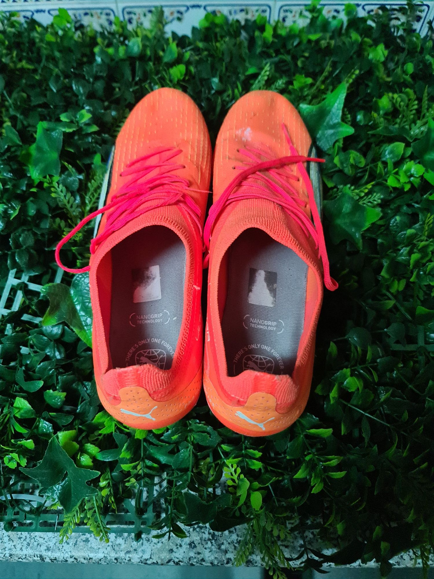 Chuteiras da Nike com pitons de alumínio