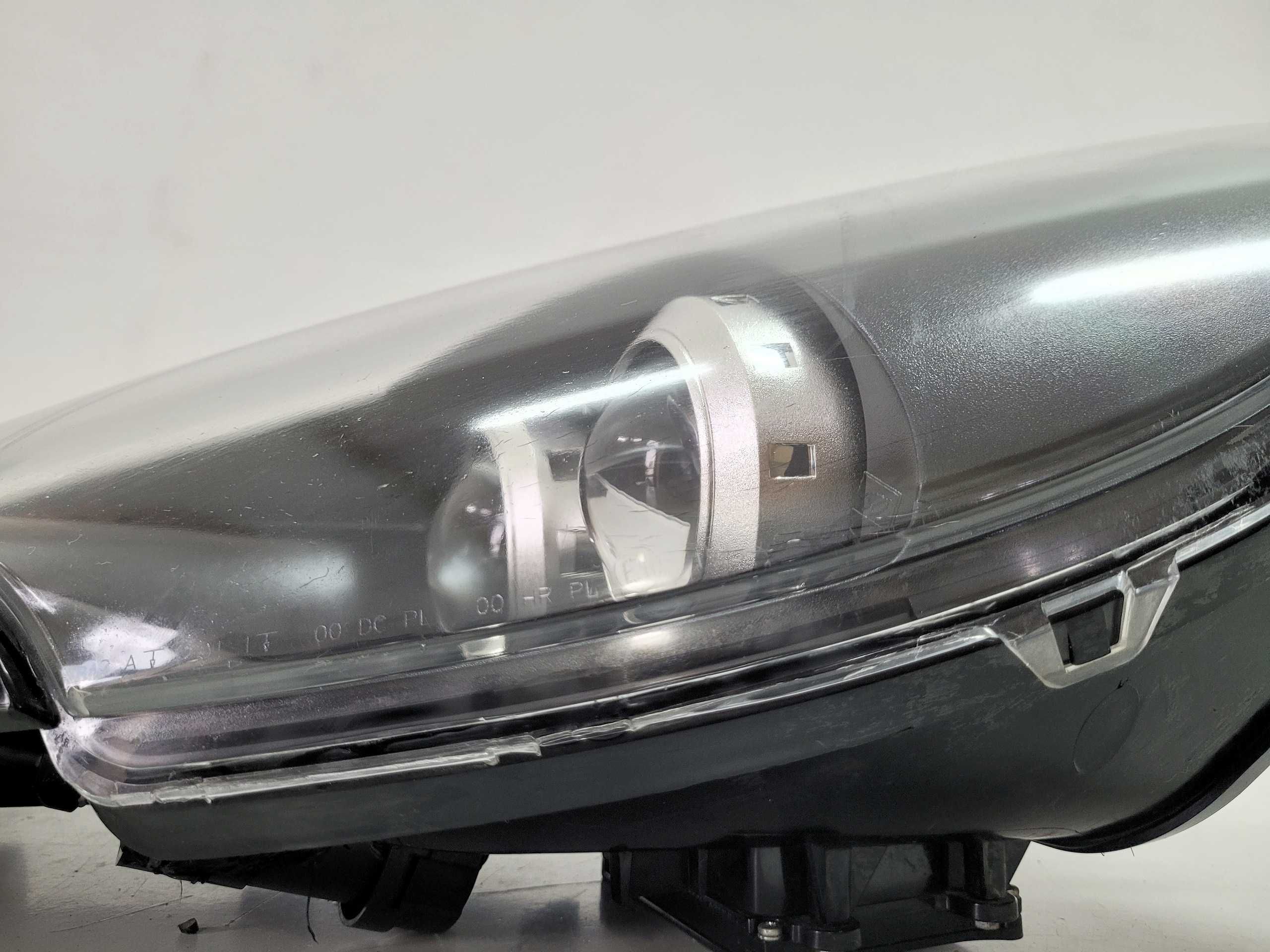 Aston Martin DB9 (04-12), DBS V12 - lampa przednia PRZÓD - LEWA