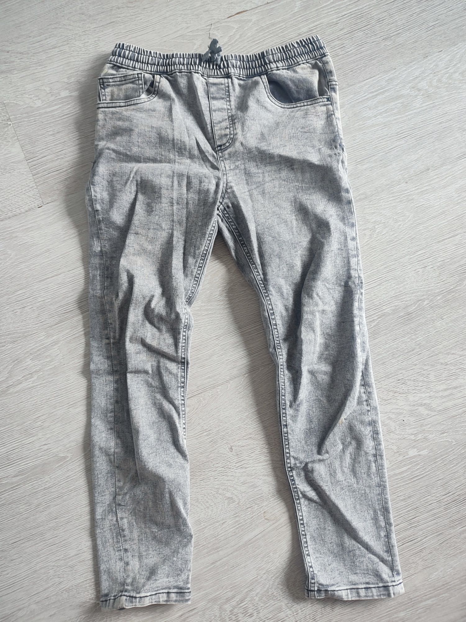 Spodnie damskie jeans szare Reserved 164
