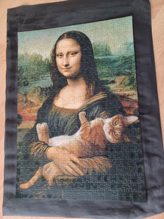 Puzzle dama z kotem obraz