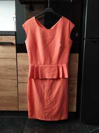 Pomarańczowa sukienka z baskinką 38