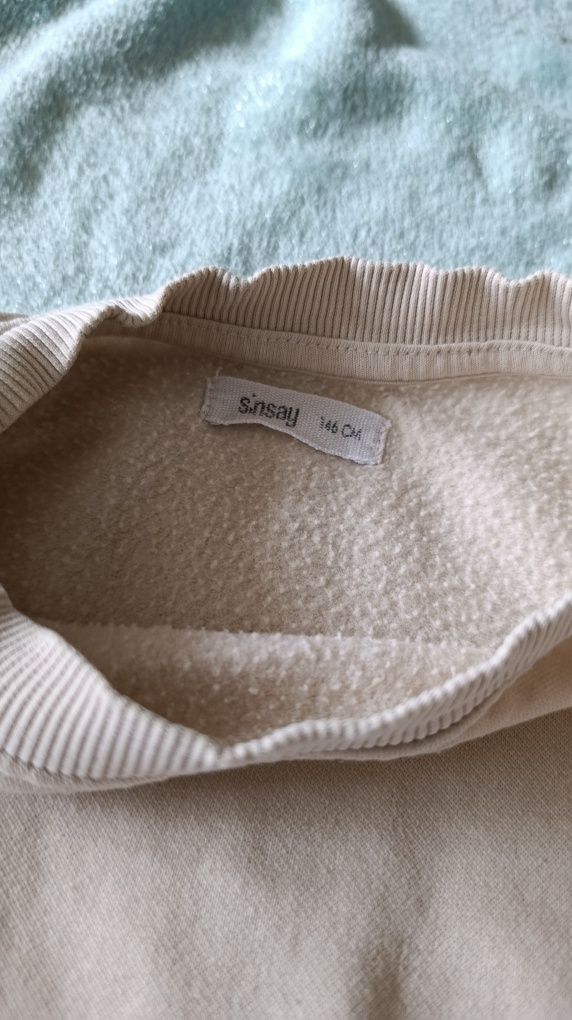 Beżowa bluza Sinsay 146
