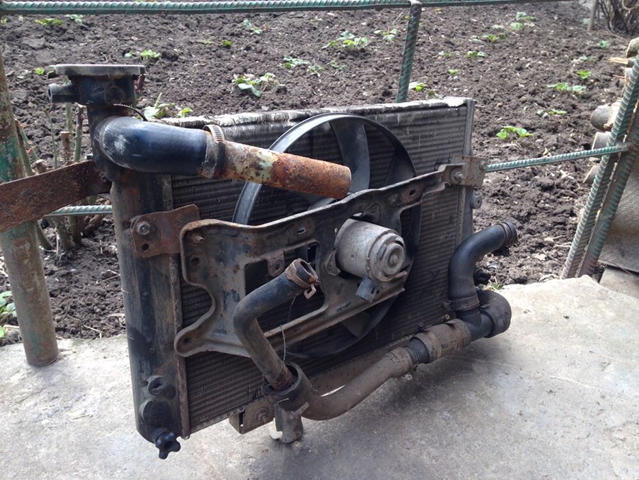 Продам радіатор + вентелятор охолодження Nissan cherry