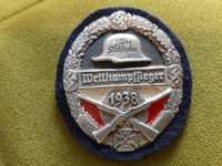 Naszywka na ramię Wetthampffieger 1938. . Metal i filc.