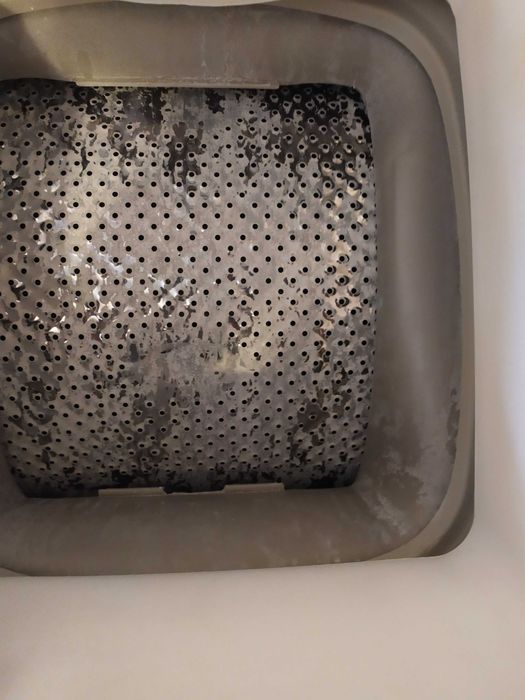 Стиральная машинка Indesit, с вертикальной загрузкой.