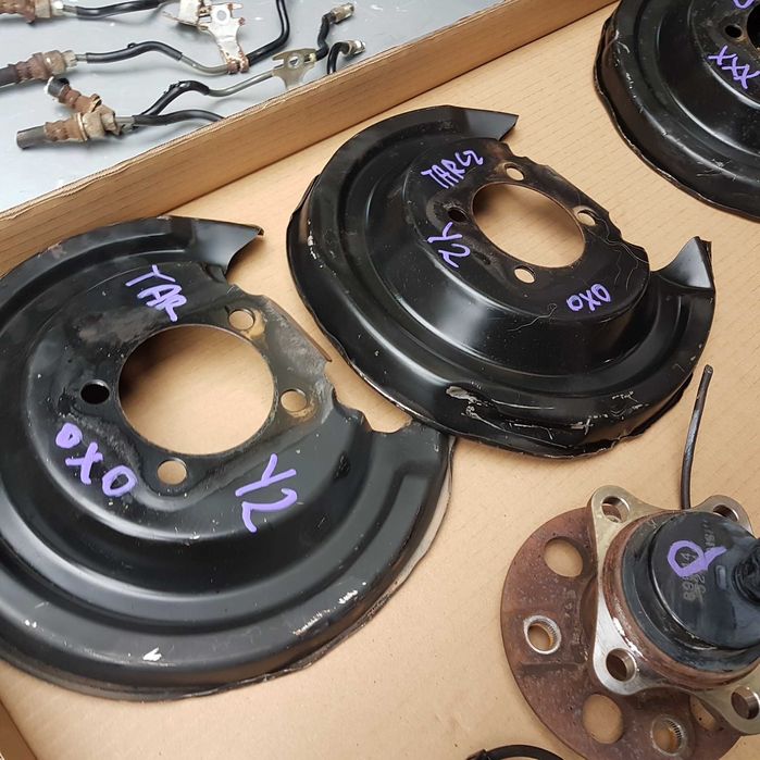 osłona błotna kotwiczna piasta abs tarcze hamulcowe klocki yaris 06-21