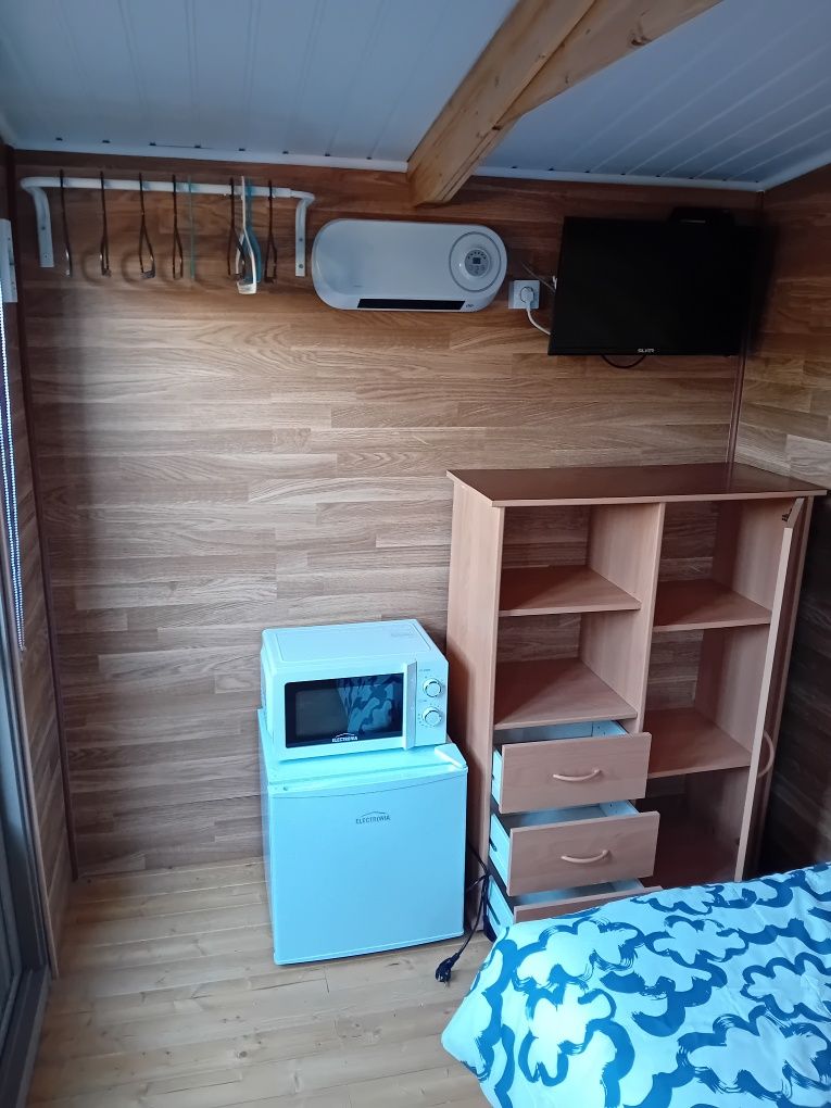 Quarto em casa de madeira