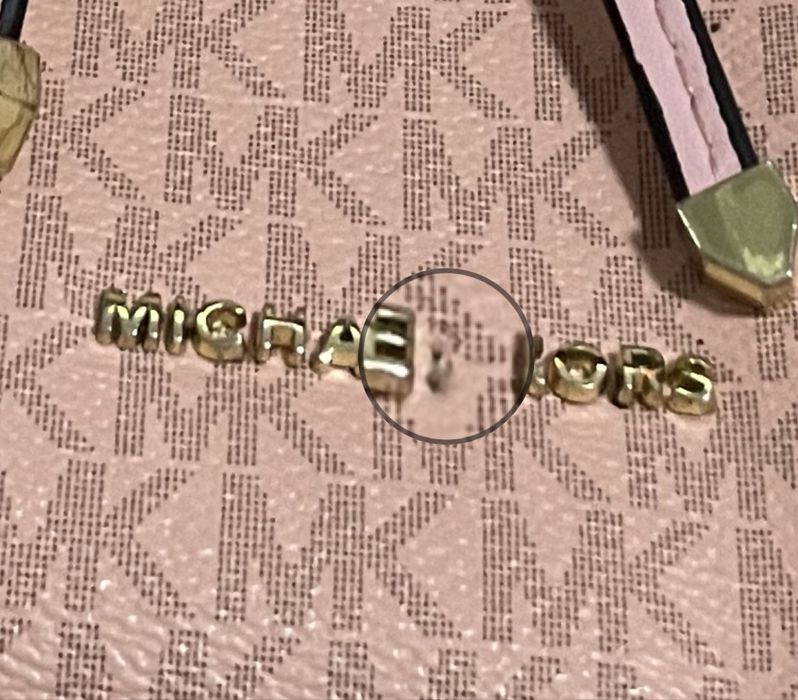 Bolsas Yves Saint Laurent e Michael Kors