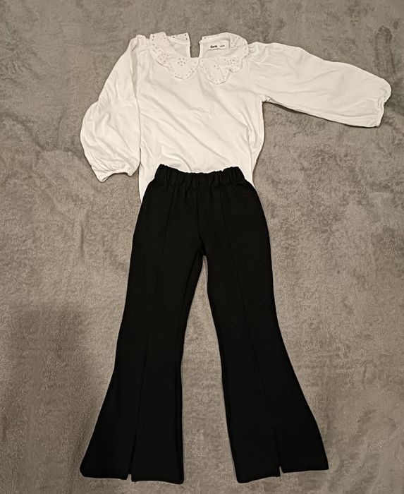 Біла блузка з брюками