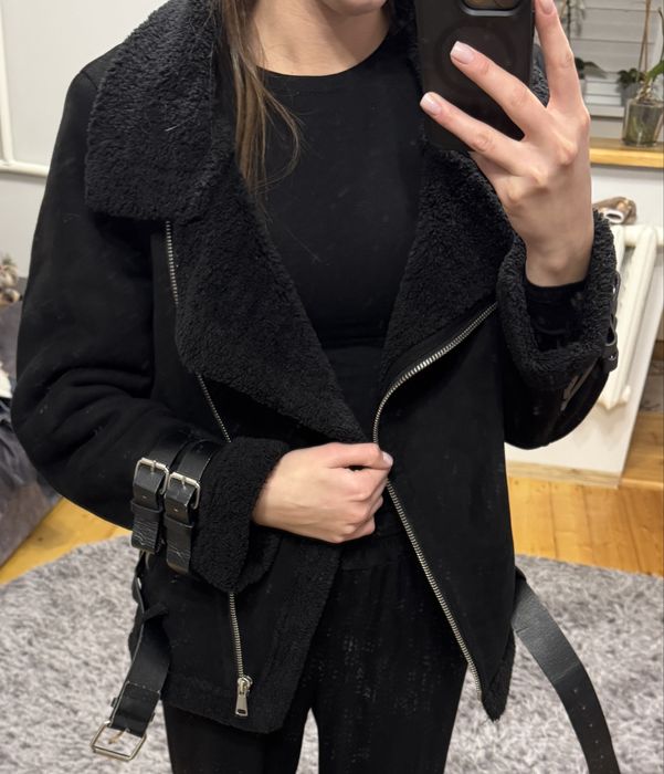 Дубльонка чорного коляру