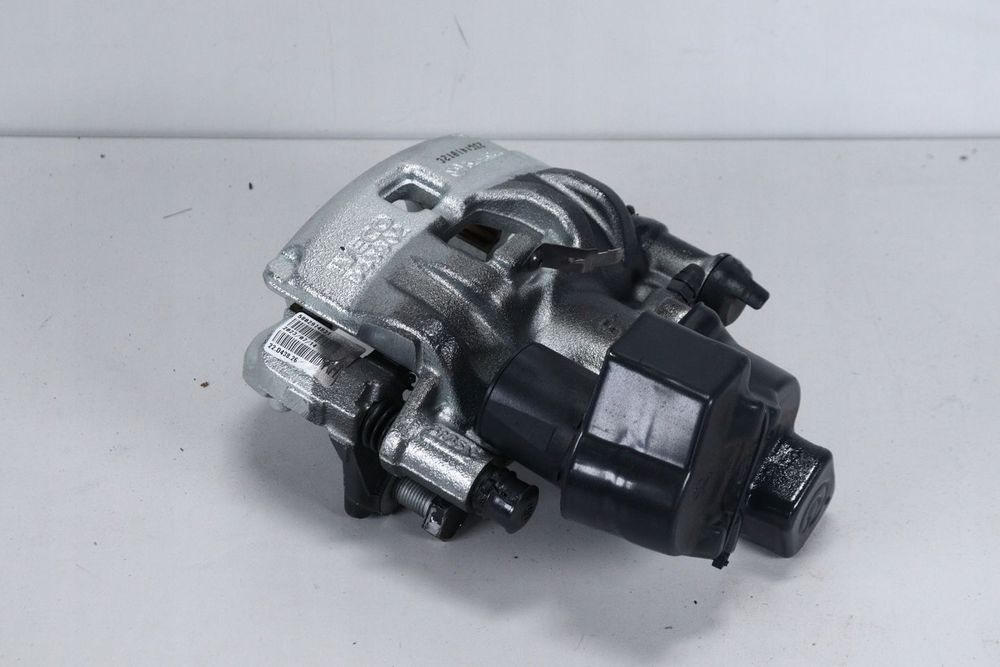 Zacisk hamulcowy prawy tył elektryczny ręczny Iveco Daily 19- S35 NOWY ORG