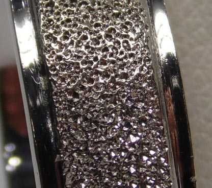 Srebrna masywna diamentowana obrączka R.19. szer. 7,2 mm.