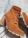 Botas usadas duas vezes