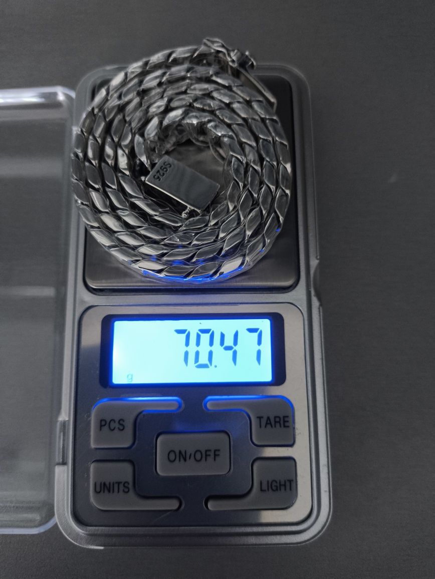Łańcuszek srebrny 55 cm, waga 70,47 g.