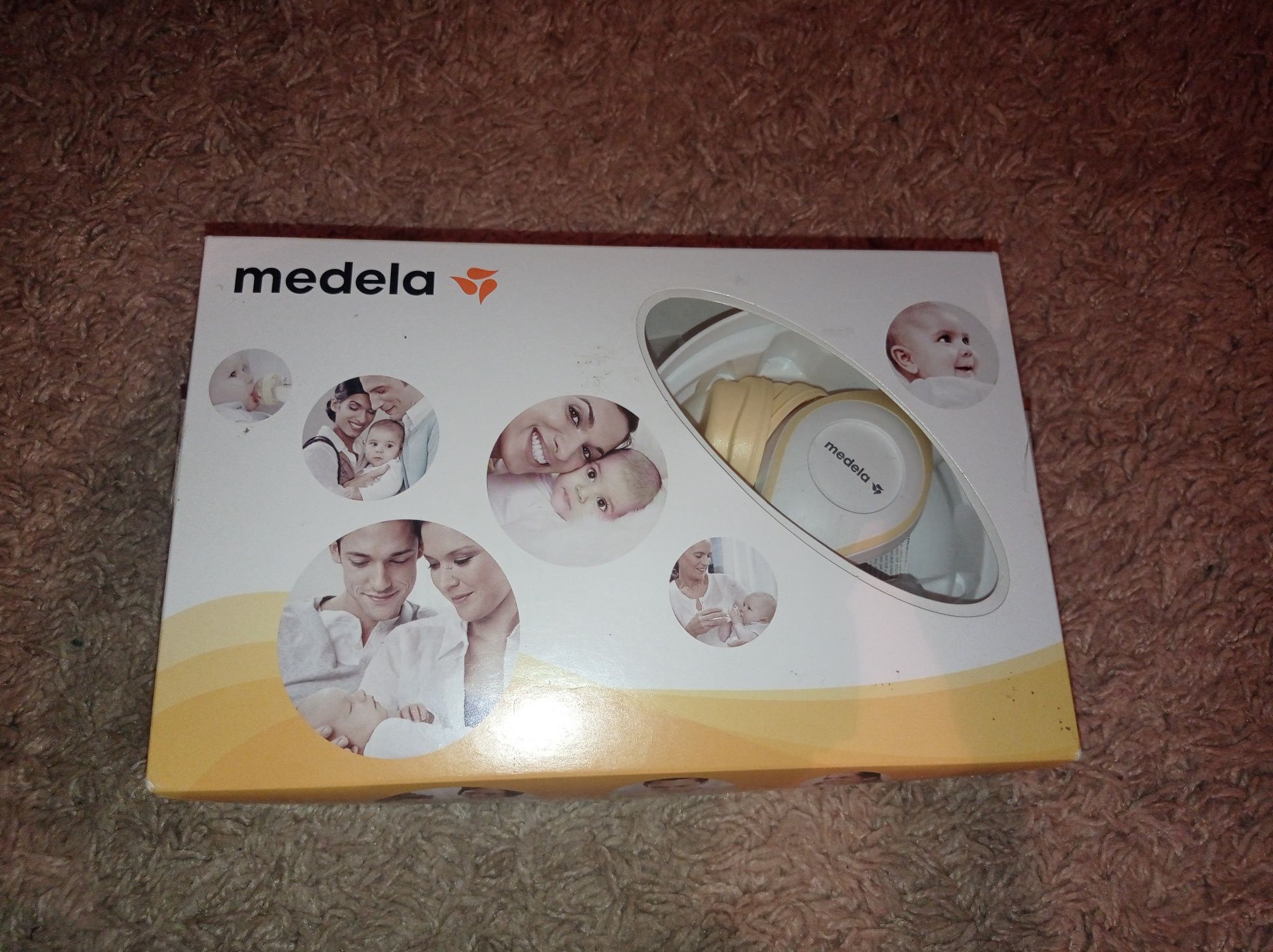 Продам ручной молокоотсос medela