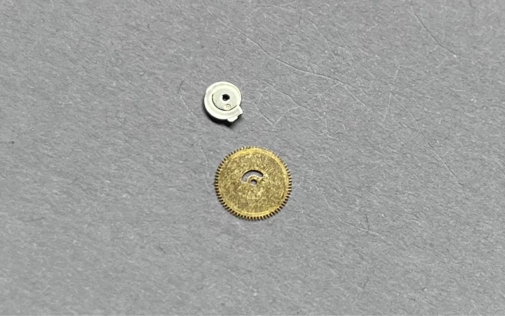 Omega 1002 Seamaster DeVille przerzutnik daty, koło