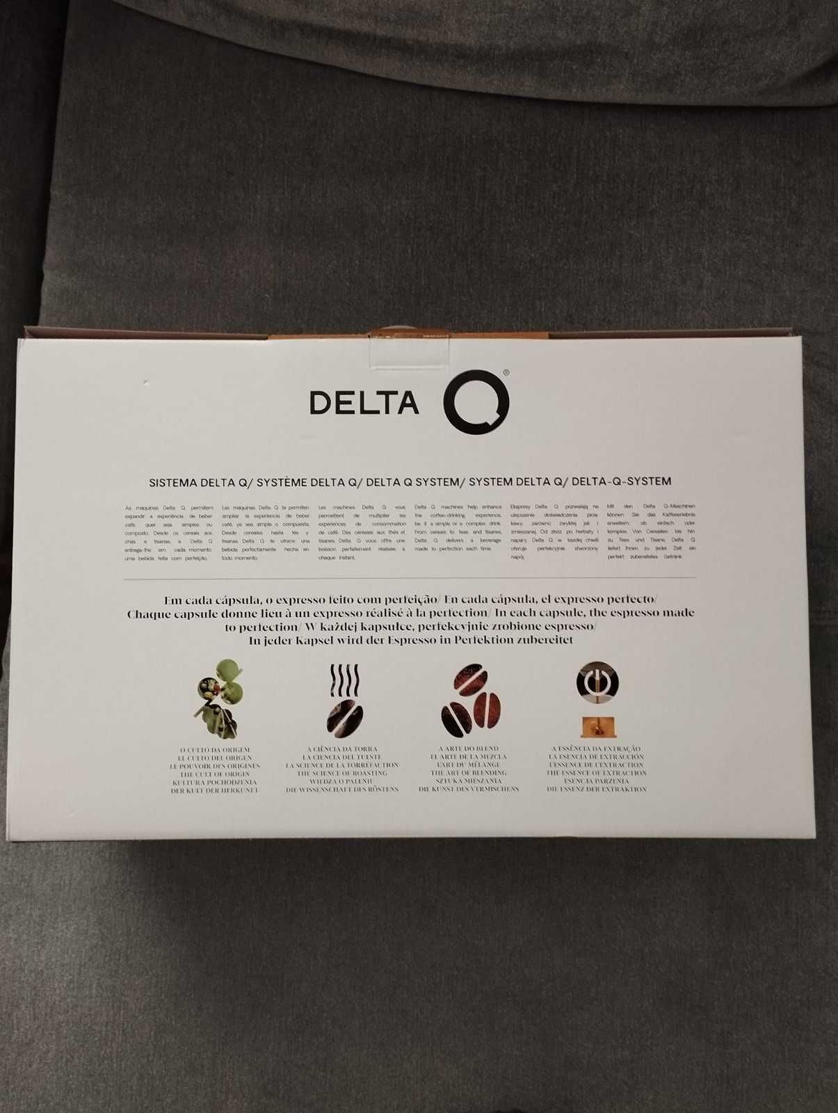 Капсульна кавоварка Nespresso Delta Q з капучинатором