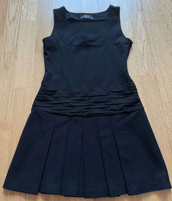 Сарафан шкільний на дівчику