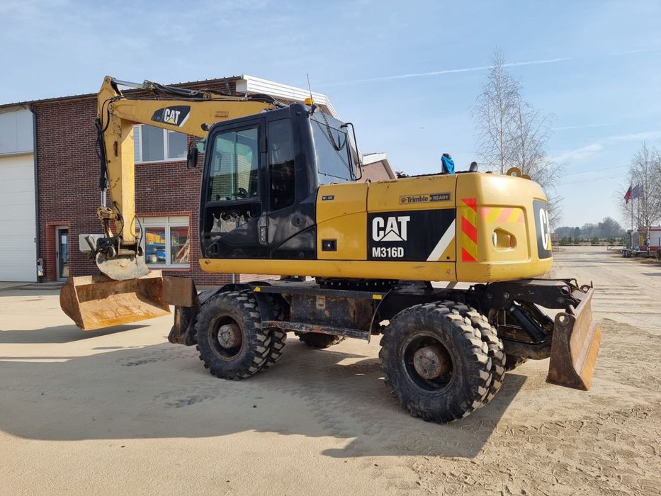 Продам колесный экскаватор Caterpillar М 316 D , 2012 г