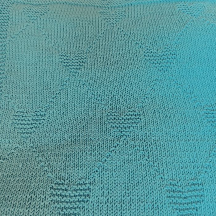 Ręcznie robiony kocyk dla niemowlaka z wełny merino