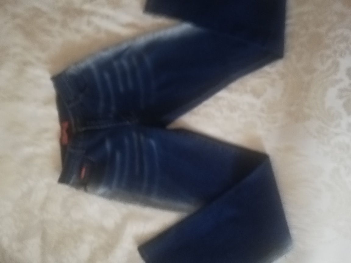 Spodnie damskie jeansy dzwony nowe M