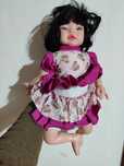 Boneca de cabelo preto