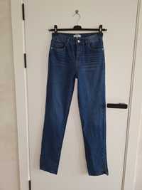 Шикарні джинси з розрізами розмір С