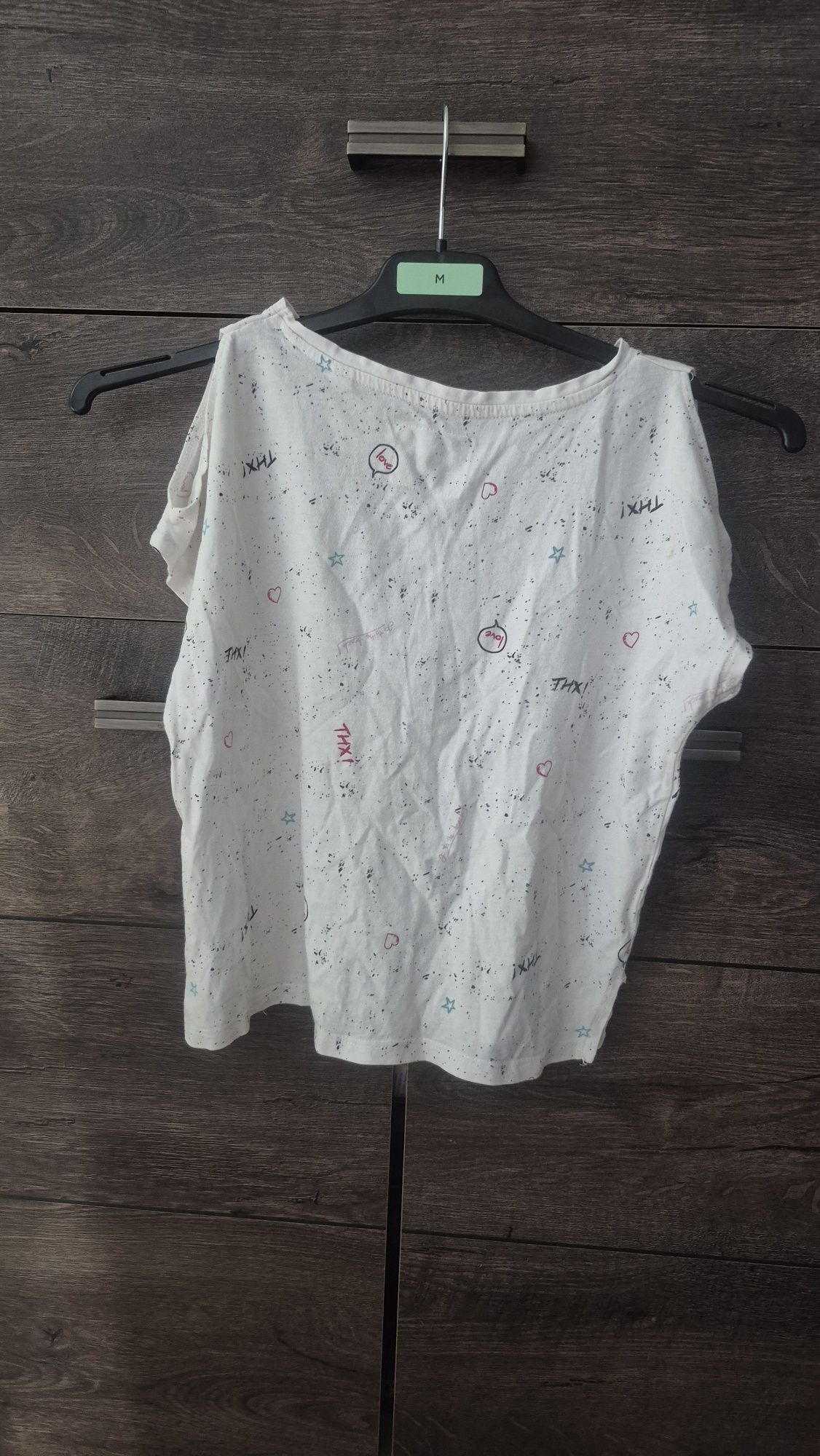 T-shirt z rozcięciami na rękawach dla dziewczynki r. 140