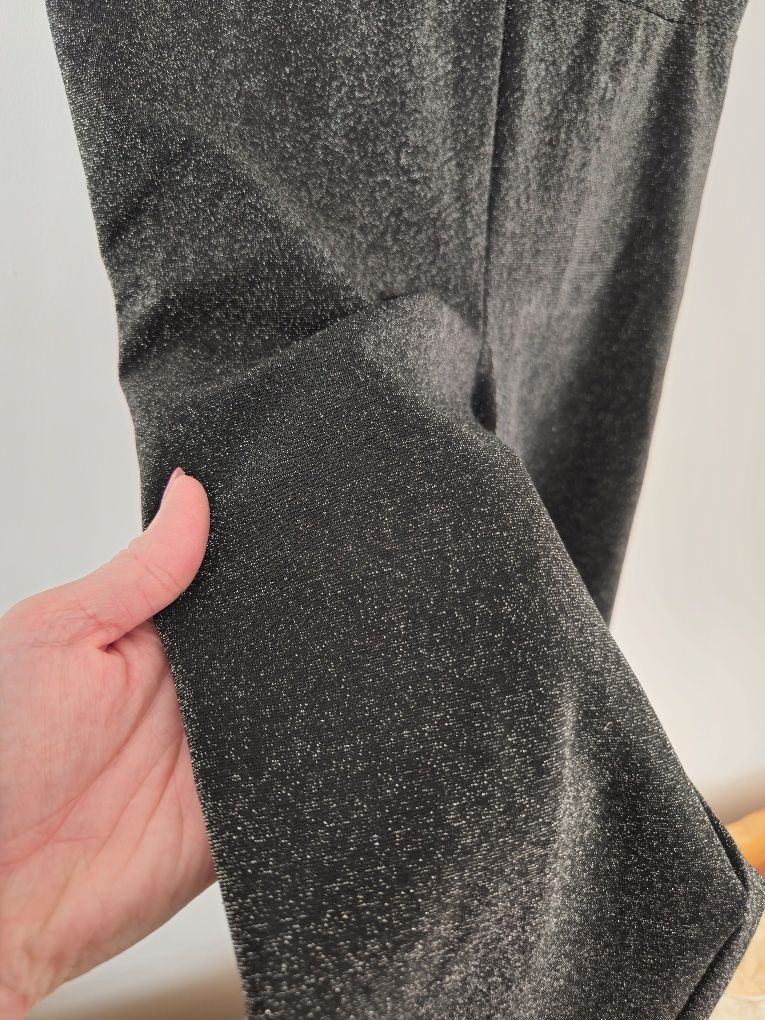 Czarne błyszczące spodnie legginsy brokatowe srebrna nitka święta TU X