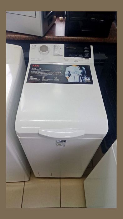 Пральна машина AEG L6TB61, вертикальне завантаження, компактна, тиха