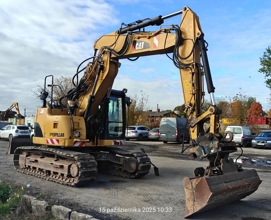 Caterpillar CAT 314D LCR compact  Cat Kompakt ogumowane gąsienice gumowe nakładki compact Volvo 145