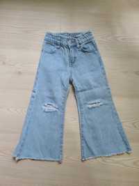 Дитячі джинси кльош з дирками на колінах