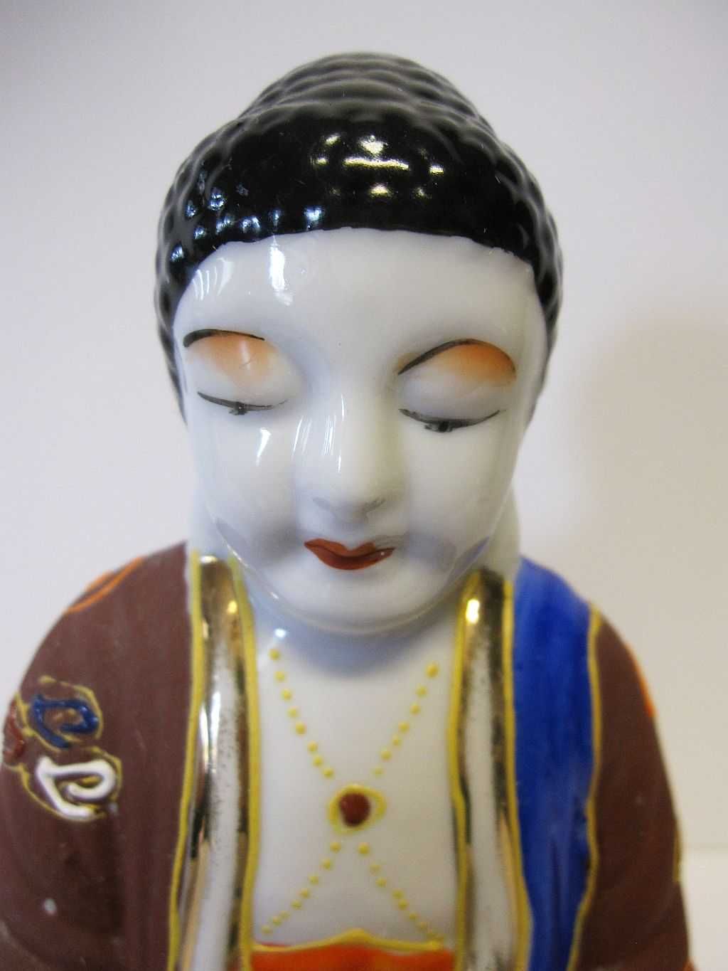 vintage figura asiática de um Buda em porcelana pintada à mão