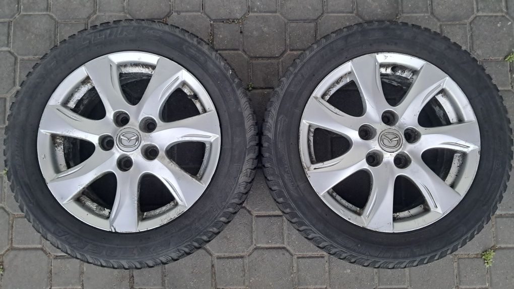 4 używane alufelgi 16" Mazda (i inne) z oponami zimowymi Continental 2