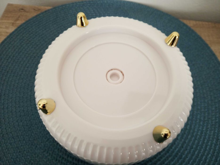 Biały obrotowy organizer na kosmetyki pędzle do makijażu kredki