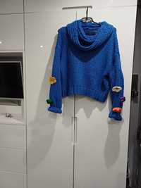 Piękny sweterek niebieski
