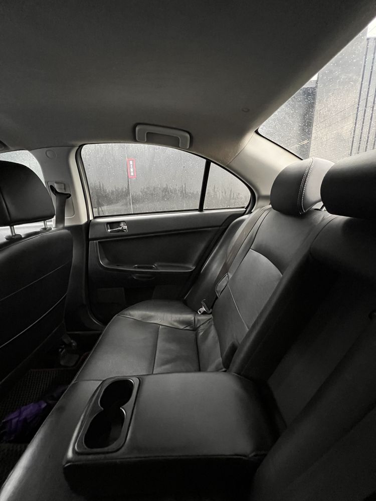 Mitsubishi Lancer 2012 • 1.6 МКПП ГАЗ/БЕНЗИН