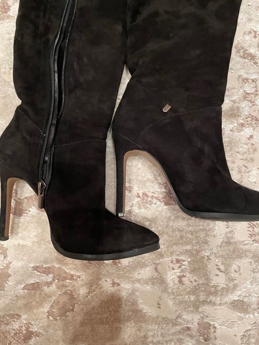 Натуральні високі ботфорди на шпильці