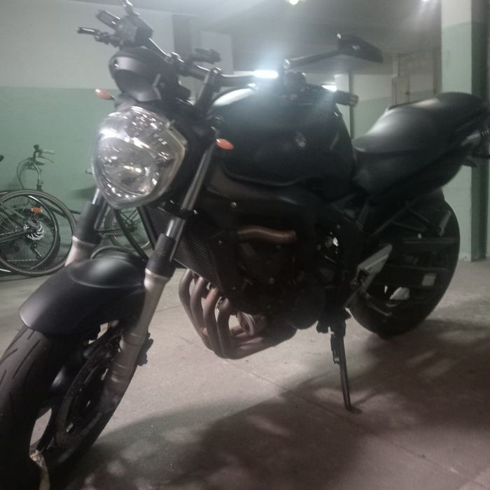 Moto fayzer  muito boa impecavel  tem 20 anos