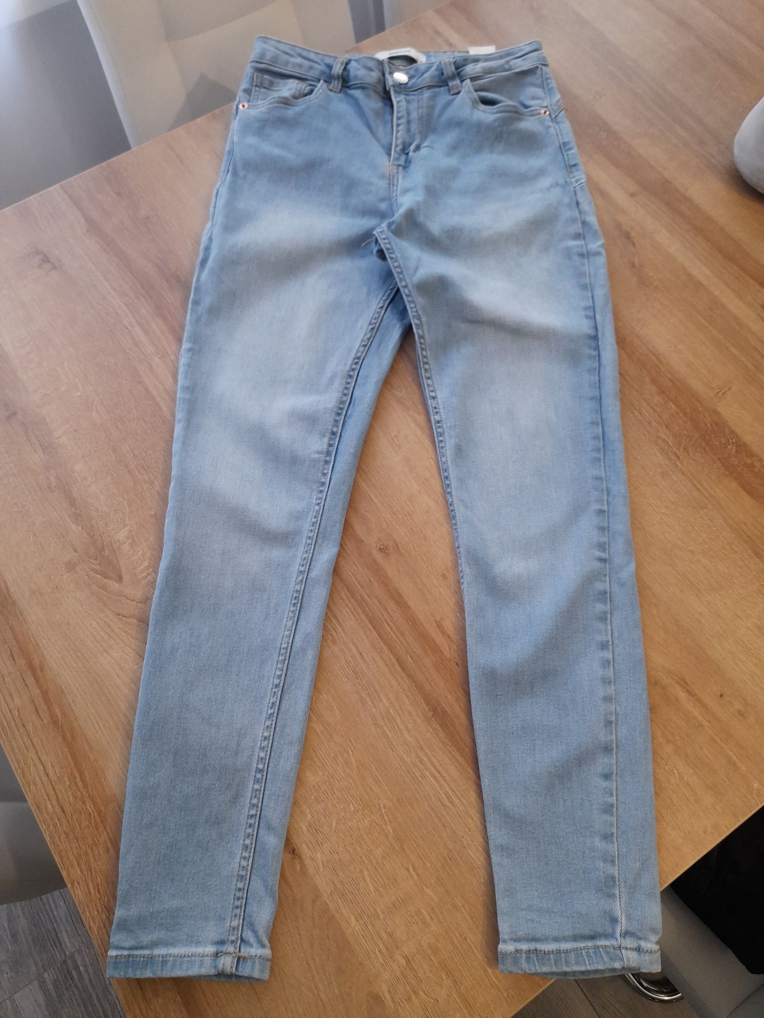 Spodnie damskie jeansy Reserved M