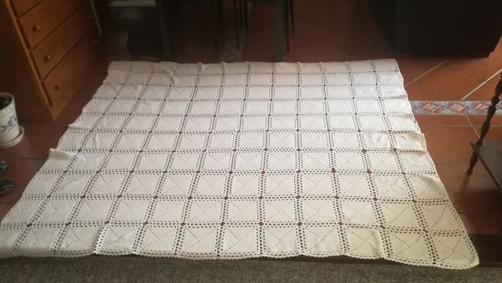Colcha rendada à mão