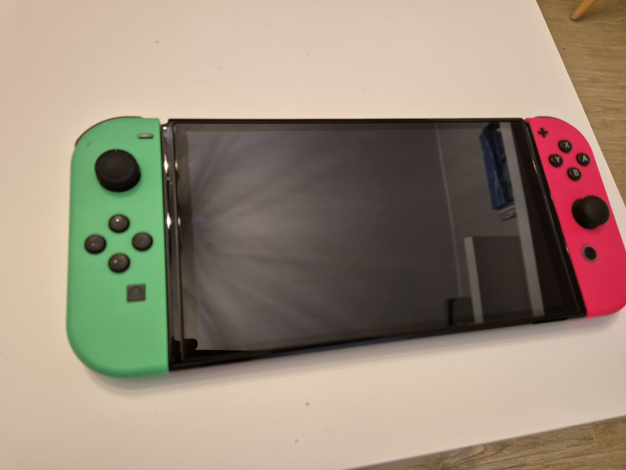 Zestaw: Nintendo Switch OLED + gry i akcesoria (Zelda, sports, arms)
