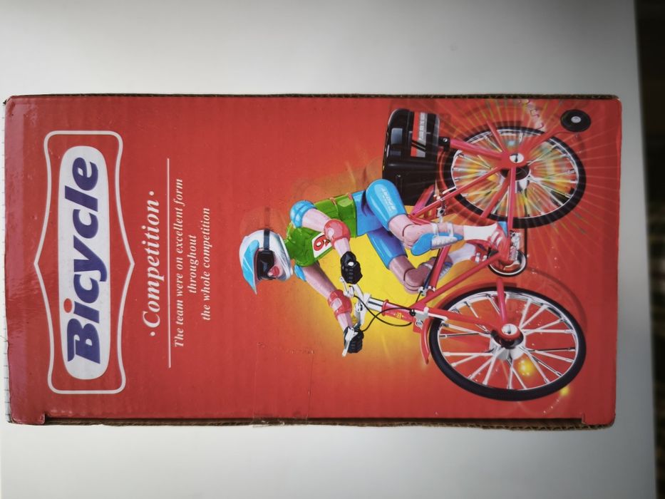 Brinquedo bicicleta. Luzes, música e movimento