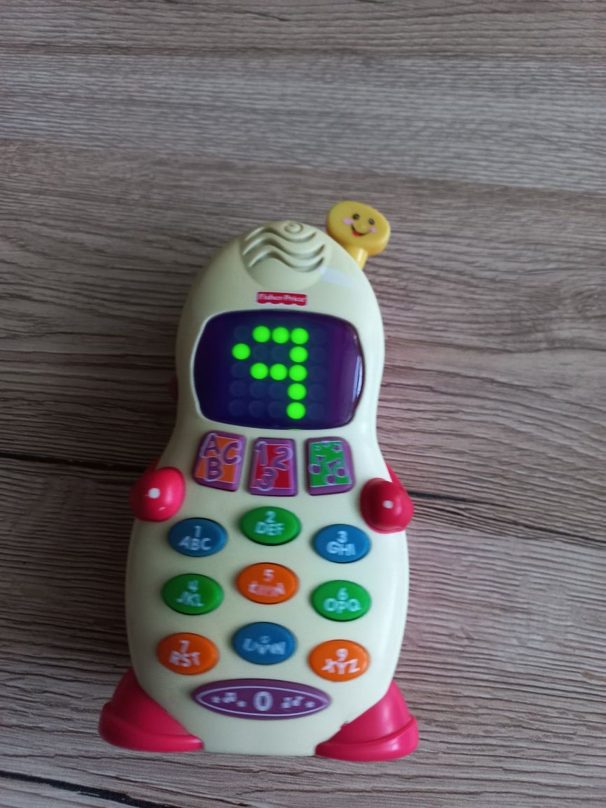 Telefon zabawka Fisher price na baterie