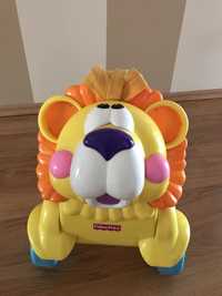 Fisher Price jeździk pchacz lew