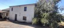 Casa geminada e ruína para restaurar, com terreno perto de Cardigos