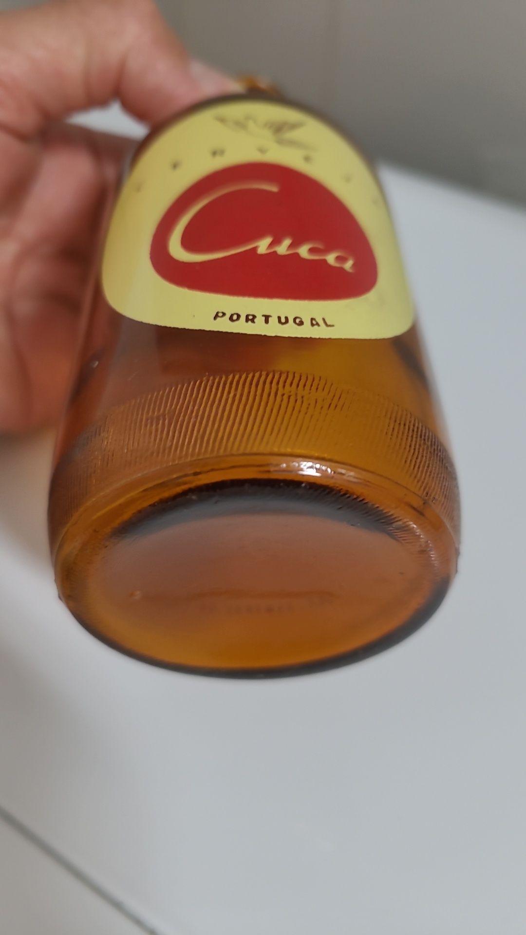 Garrafa pirogravada da antiga cerveja Angolana CUCA