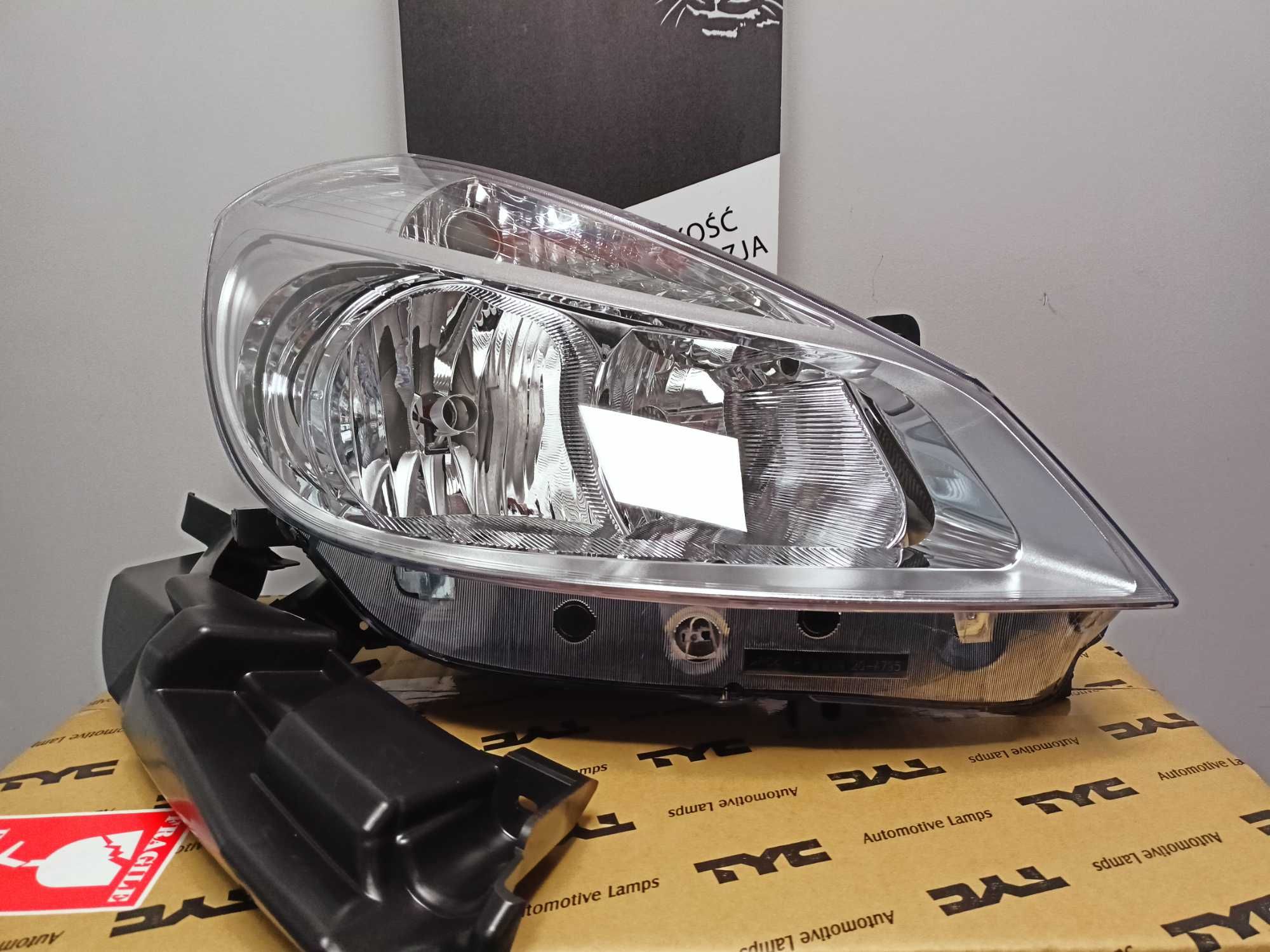Renault Clio III 05- Reflektor/Lampa przód prawy /H7+H7